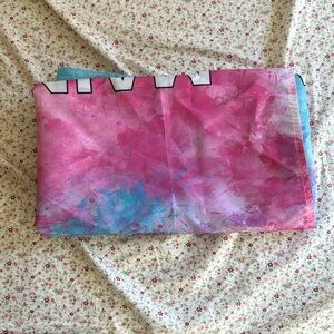 Multicolor flag says “main character vibes”